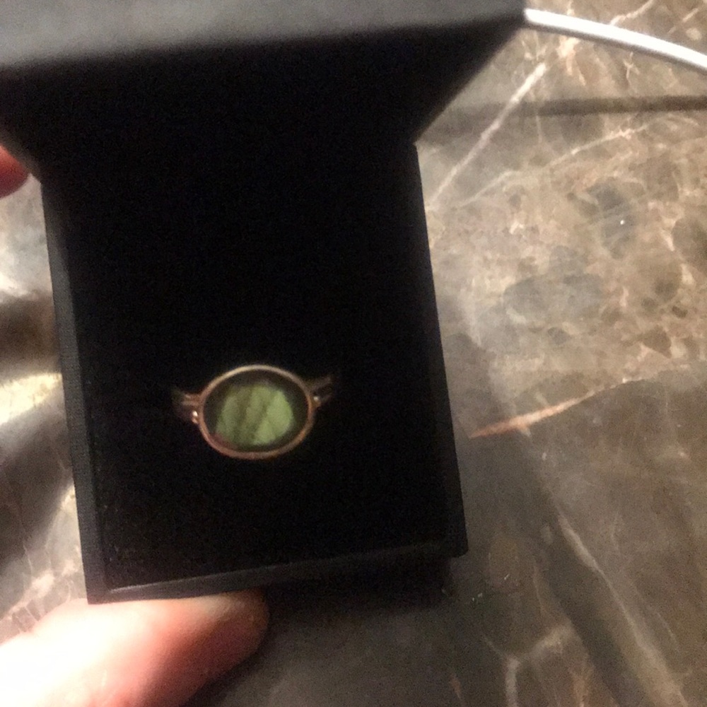 Silver ring with greenish moonstone